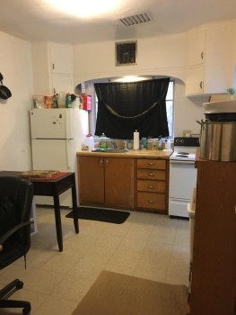 46 Center Street apartment 2 kitchen with fridge and stove
