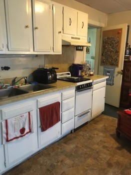 7 Otsego Street kitchen with stove toaster and coffeemaker